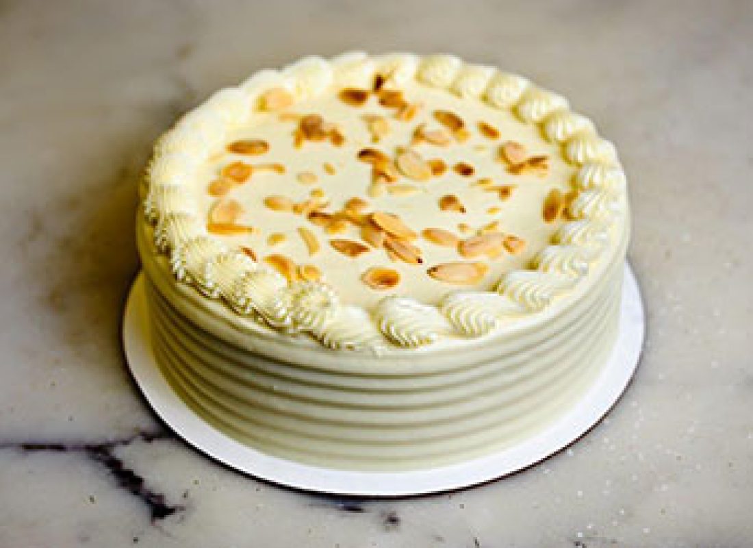 Expert bakers at work in Pearland, TX, producing high-quality baked goods for Roland's Swiss Pastry & Bakery